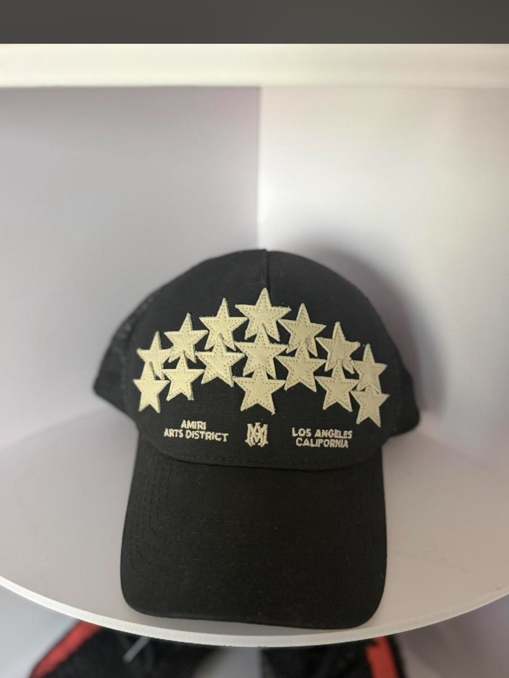 AMIRI Black trucker hat